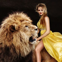 woman riding a lion