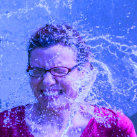 woman sprayed with water