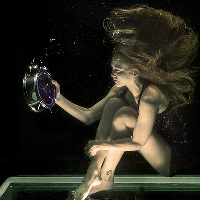 woman and clock under water