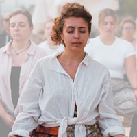 meditating woman connecting to many minds