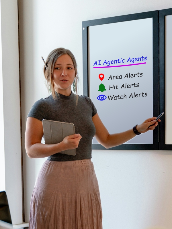 business woman at whiteboard explaining agentic agents