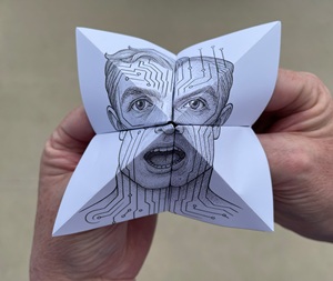 paper chatterbox with an AI face