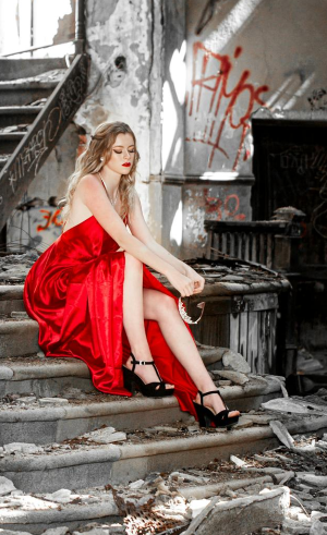 woman in red dress abandoned
