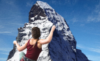 woman climbing a mountain