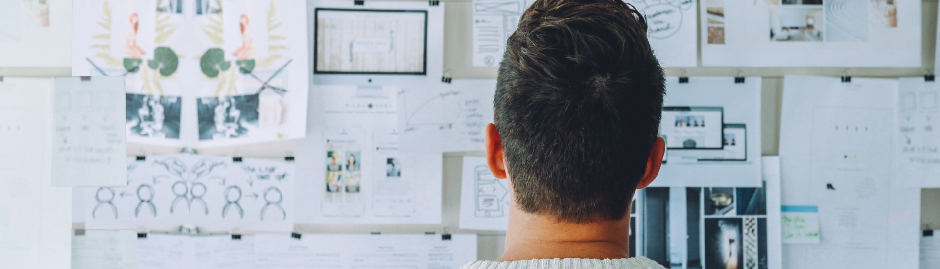 three engineers in a meeting around a table