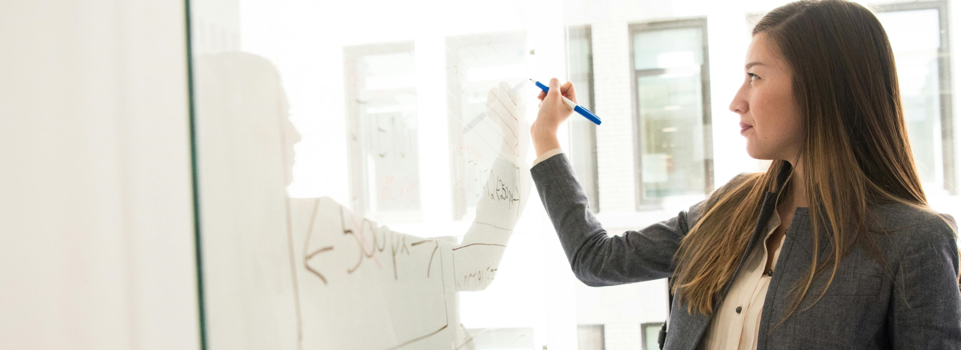 engineer at whiteboard