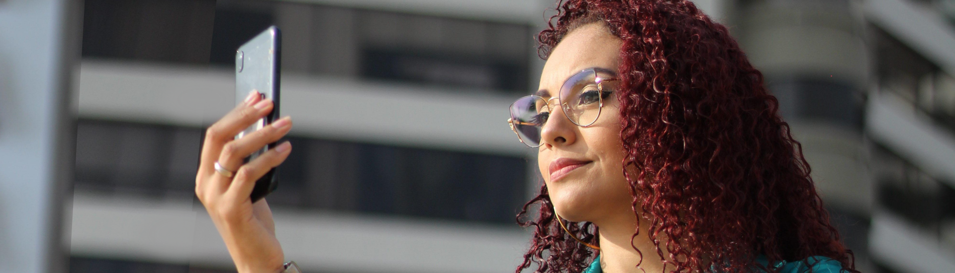 business woman checking email on phone