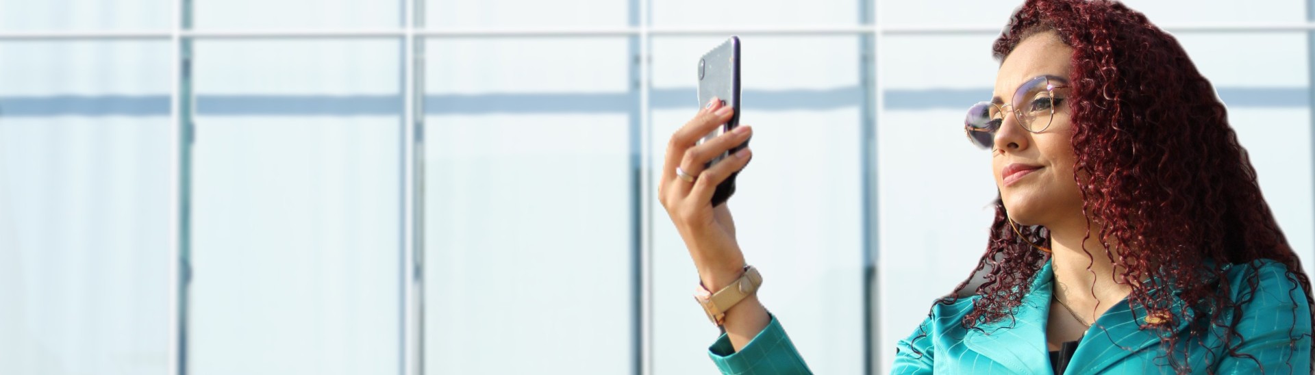 business woman checking email on phone